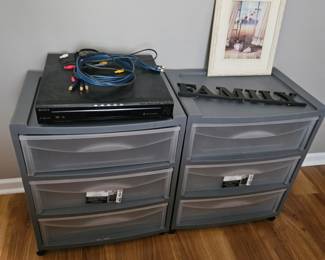 Plastic drawered containers and Sony disc player