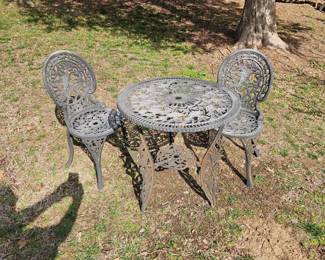 Cast iron table with 2 chairs