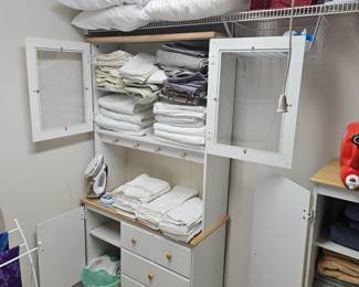 Pillows, Sheets and great Glass Door Cabinet