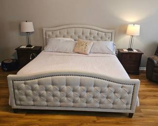 King size bed with tufted linen  headboard and foot board