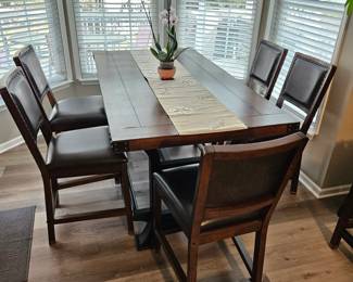 Bar height table with  chairs