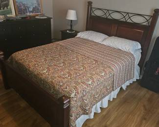 Wood and iron queen bed