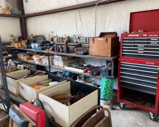 half of garage are tools 