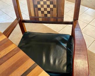 6 chairs with inlaid wood cutouts 