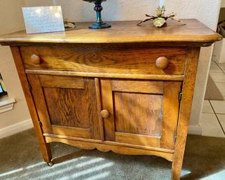 Antique oak washstand cabinet, $325