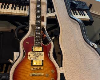 With original case and Les Paul Book