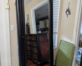 Mirror unit opens to reveal jewelry storage, see next photo