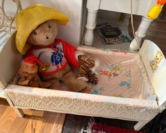 Vintage Wicker Doll Cradle with Paddington Bear and other plush toys