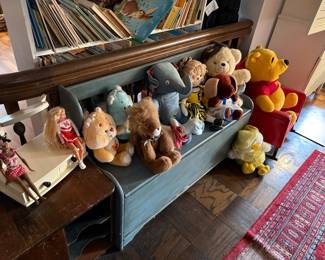 Collection of Assorted Stuffed Animals and Dolls including Winnie the Pooh, Care Bear-style, and Vintage Dolls