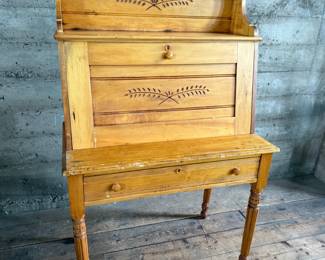 This lot features a plantation-style secretary desk with intricate details throughout that measures, 60.5” H x 36” W x 20.5” D.