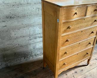 This lot features a stunning highboy dresser with a harp mirror with six (6) drawers and sitting on casters. This dresser measures with mirror, 65” H x 33.5” W x 18” D.