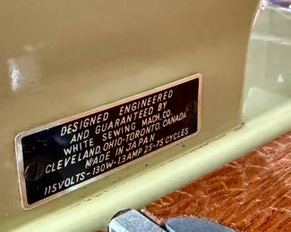 This lot features an antique sewing machine cabinet that is housing a White model 530 with a pedal as shown in photos. Comes untested, but appears to be in very good condition and measures (closed), 31.5” H x 27” W x 19” D.