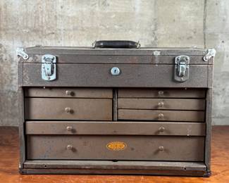 This lot features a vintage Dunlap machinist chest that measures, 13” H x 20” W x 9.25” D.