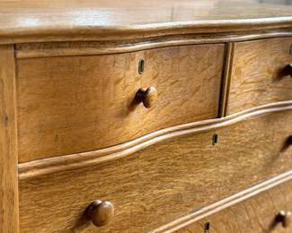 This lot features a stunning highboy dresser with a harp mirror with six (6) drawers and sitting on casters. This dresser measures with mirror, 65” H x 33.5” W x 18” D.