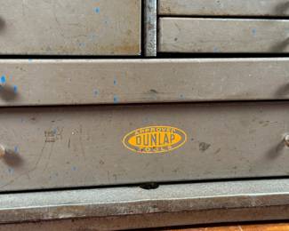 This lot features a vintage Dunlap machinist chest that measures, 13” H x 20” W x 9.25” D.