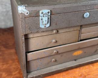 This lot features a vintage Dunlap machinist chest that measures, 13” H x 20” W x 9.25” D.