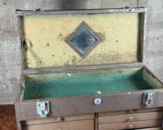 This lot features a vintage Dunlap machinist chest that measures, 13” H x 20” W x 9.25” D.