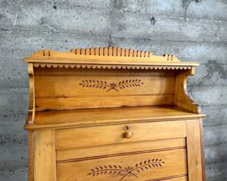 This lot features a plantation-style secretary desk with intricate details throughout that measures, 60.5” H x 36” W x 20.5” D.