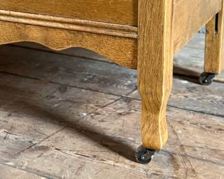 This lot features a stunning highboy dresser with a harp mirror with six (6) drawers and sitting on casters. This dresser measures with mirror, 65” H x 33.5” W x 18” D.