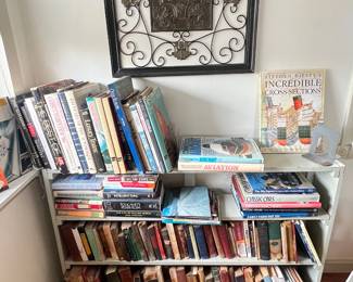 A wide selection of books, some vintage