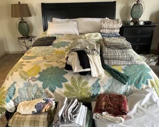 Queen Bed  with clothing