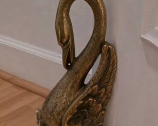 Solid brass swan doorstop