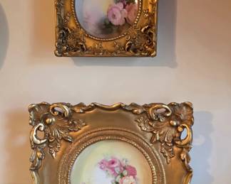 Vintage porcelain plates in frames