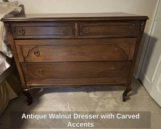 Antique Walnut Dresser with Carved Accents