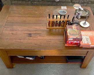 This is a great picture of the coffee table available in the sale.  Note also the pipe stand and six pipes.  If nothing else, it's a nice conversation piece.