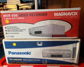 And here we have two more VHS player/recorders.  