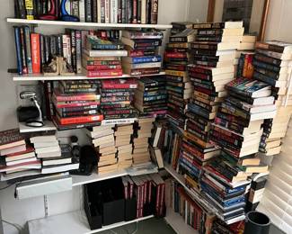 Here is the picture showing the book collection.  Come rescue the shelves by taking some (or all) of the books home with you.