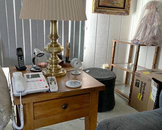 This is the other, matching end-table, the matching lamp, and a tiny portion of other furniture.  There is a small shelf unit in the corner, under the art.
