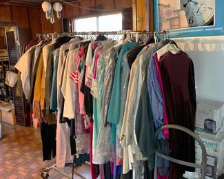 Like many sales, we have clothing, and here is a picture of some of it on a rack.