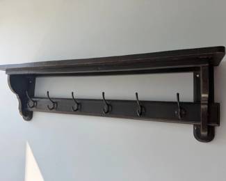 Rustic dark wood farmhouse style towel or coat rack