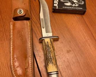 Custom numbered special edition Buck knife in leather sheath
