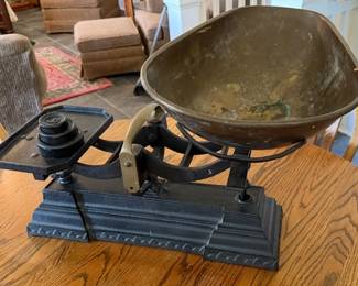 Antique cast iron industrial scale with weights
