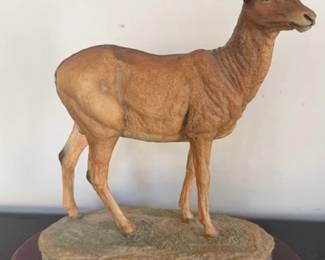 Leather wrapped Antelope figurine on soapstone and wood base