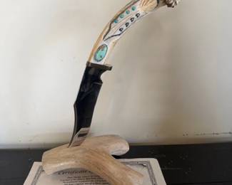 Paul Hacker Eagle Feather handmade knife on antler stand