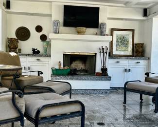Outdoor entertaining area.  Chairs with ottoman etc!