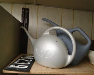 Plastic watering cans