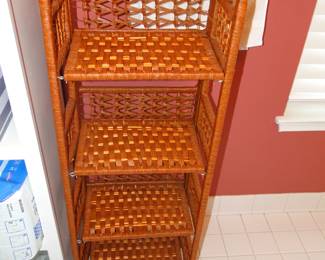 Four shelf wicker stand, perfect for the kitchen or bathroom