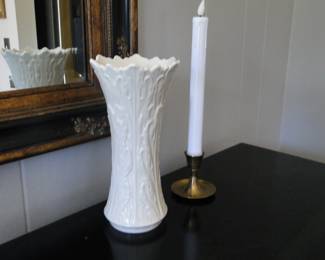 White vase and the other flamless candle