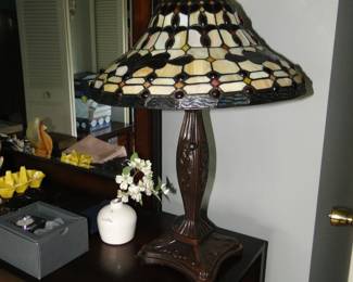 Stained glass table lamp, or you can put it on a dresser, nobody will judge