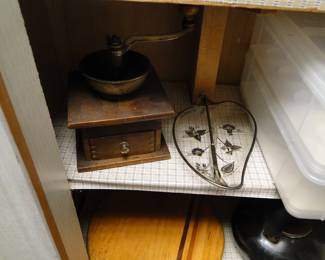 Vintage coffee grinder, and a very nice Mid Century Modern nuts server. Or it could be a very nice mid Century Modern candy dish