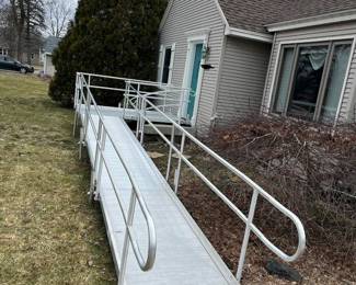 Wheelchair ramp. Landing is 5’x9’. Sloped ramp is 3sections 3’x7’ each