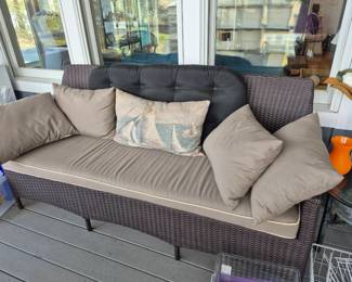 Wicker sofa with sunbrella cushions