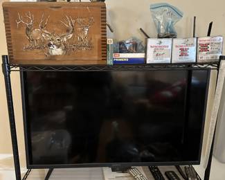 Flat screen TV, Ammo, Reels, chest