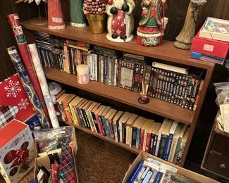 Christmas items and CD's, DVD,s VCR tapes and books, shelf