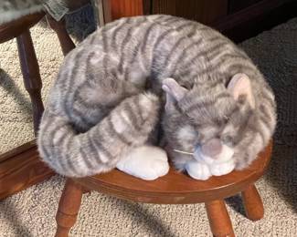 Sleeping Cat Plush On Wooden Stool