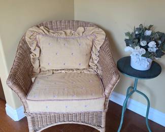 Tan wicker chair with padding